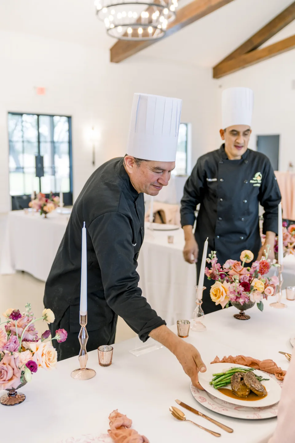 Mana Sabroso chefs preparing plates at a venue