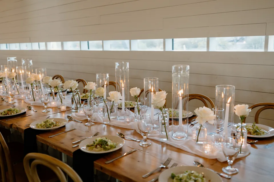A long wedding reception table ready for the celebration
